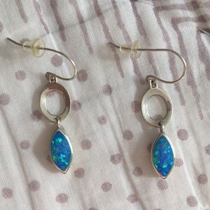Two pairs of silver earrings with blue stones